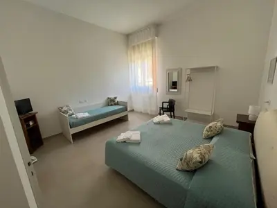 Letto o letti in una camera di Casa Cloe