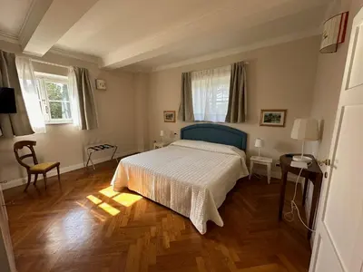 Letto o letti in una camera di Casa con giardino Guest 98