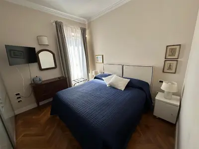 Letto o letti in una camera di Casa con giardino Guest 98