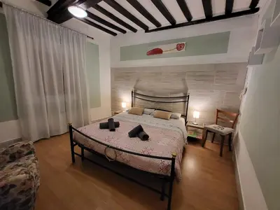 Letto o letti in una camera di B&B Casa Fei