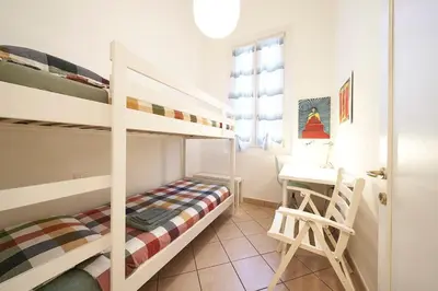 Letto o letti in una camera di Careggi Garden Flat