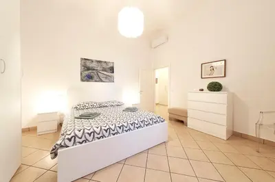 Letto o letti in una camera di Careggi Garden Flat