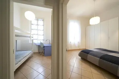 Letto o letti in una camera di Careggi Garden Flat