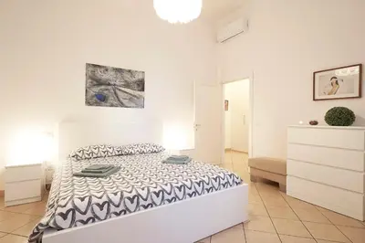 Letto o letti in una camera di Careggi Garden Flat