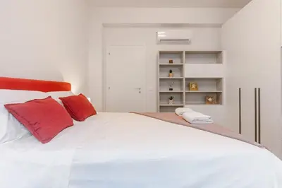 Letto o letti in una camera di Bright & Modern 4 bedrooms Apartment in Center