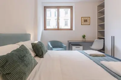Letto o letti in una camera di Bright & Modern 4 bedrooms Apartment in Center