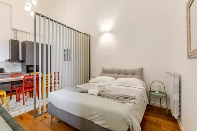 Letto o letti in una camera di GuestHost - Giardino della Fortezza Chic Apartment