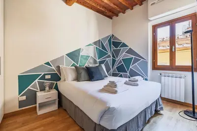Letto o letti in una camera di Porta Romana Charme Flat - Florence Dolce Vita
