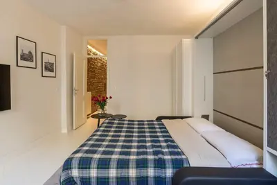 Letto o letti in una camera di Signoria Tower Apartment