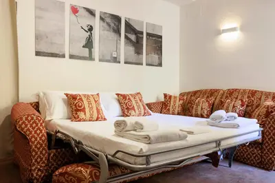 Letto o letti in una camera di Sweet House in Pepi Street