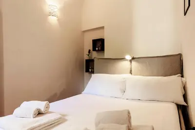 Letto o letti in una camera di Sweet House in Pepi Street