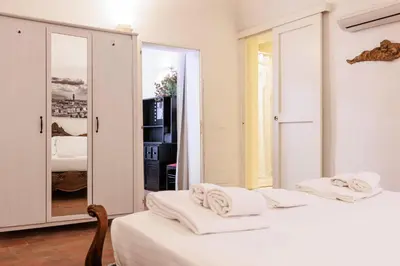 Letto o letti in una camera di Sweet House in Pepi Street