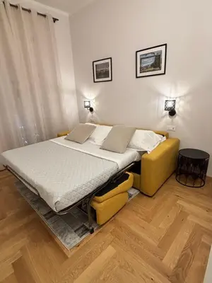 Letto o letti in una camera di La casa di Emmy