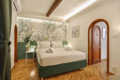 Letto o letti in una camera di Campuccio Suite in Oltrarno, Florence
