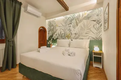 Letto o letti in una camera di Campuccio Suite in Oltrarno, Florence