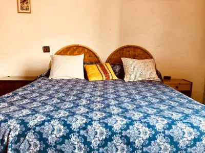 Letto o letti in una camera di Appartamento in San Donato Novoli a poca distanza dalla Tranvia