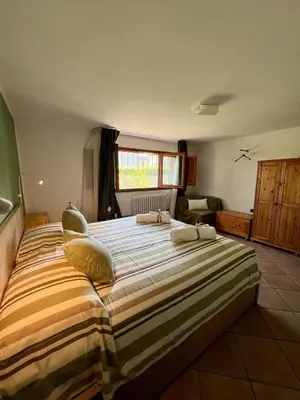 Letto o letti in una camera di Casa Oasi nel verde