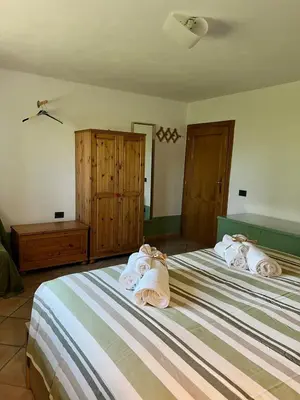 Letto o letti in una camera di Casa Oasi nel verde