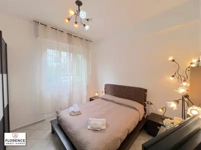 Letto o letti in una camera di La Casina di Vingone by Florence Sweet Homes srl