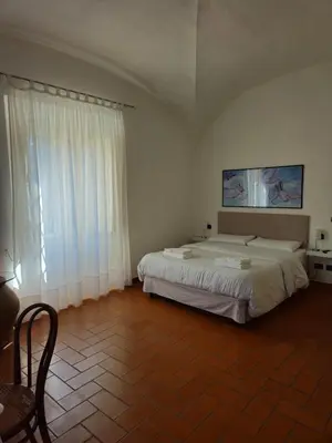 Letto o letti in una camera di Villa Taccetti - Appartamento 
