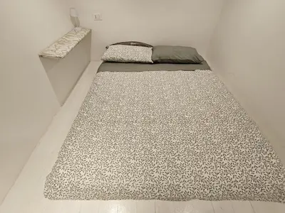 Letto o letti in una camera di Florence Colonna Spa