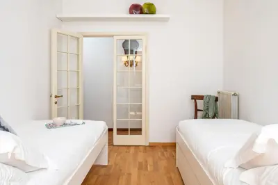 Letto o letti in una camera di Arno Mile