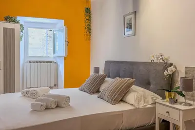 Letto o letti in una camera di Casa dei Leoni - Dolcevita Holiday