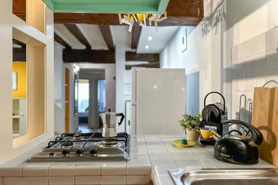 Cucina o angolo cottura di Casa dei Leoni - Dolcevita Holiday