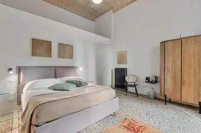 Letto o letti in una camera di Three Rooms D'AZEGLIO 12