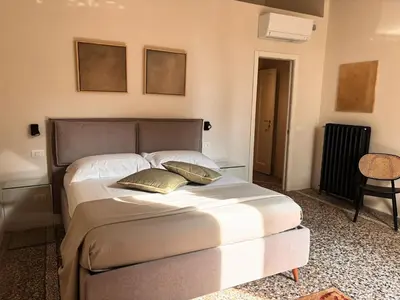 Letto o letti in una camera di Three Rooms D'AZEGLIO 12
