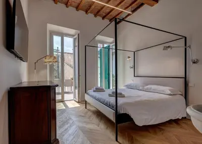 Letto o letti in una camera di San Gallo Apartment by Mamo Florence