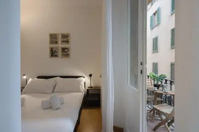 Letto o letti in una camera di Ponte Vecchio Central Vintage Apartment