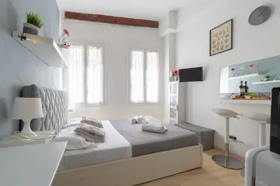 Letto o letti in una camera di Beatrice Suite Apartment