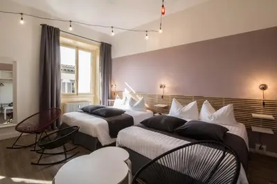 Letto o letti in una camera di MDR Liliac Apartment