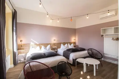 Letto o letti in una camera di MDR Liliac Apartment