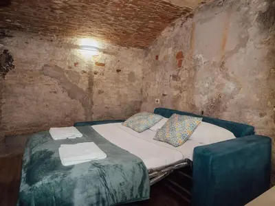 Letto o letti in una camera di Antonino Warm Escape Near Florence's Treasures