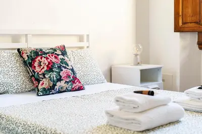 Letto o letti in una camera di Maragliano House By San Firenze Collection