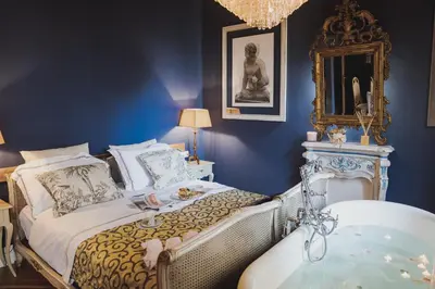 Letto o letti in una camera di Romantic Suite