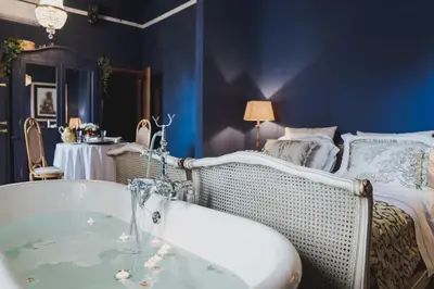 Letto o letti in una camera di Romantic Suite