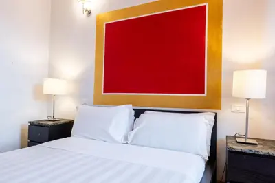 Letto o letti in una camera di Sant'Ambrogio Apartments - Michelangelo