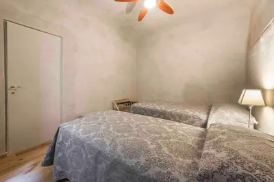 Letto o letti in una camera di Casa Vitto by MMega