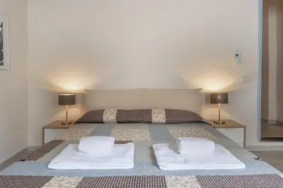 Letto o letti in una camera di San Cristofano Blu Apartment Santa Croce, Florence