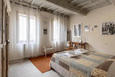 Letto o letti in una camera di San Cristofano Blu Apartment Santa Croce, Florence