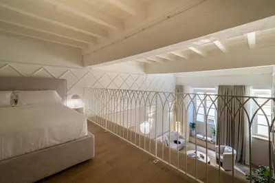 Letto o letti in una camera di Deservi Charming Apartments