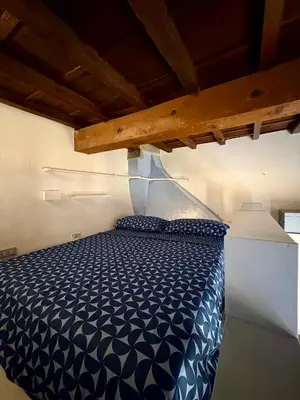 Letto o letti in una camera di Pothos by monteverdi