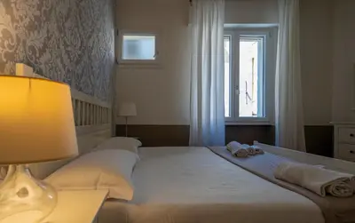 Letto o letti in una camera di Maso Finiguerra