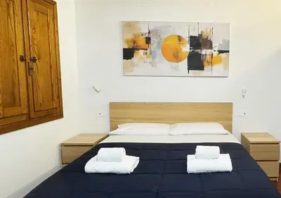 Letto o letti in una camera di Casa di Ciapa - Boutique Apt nel cuore di Firenze