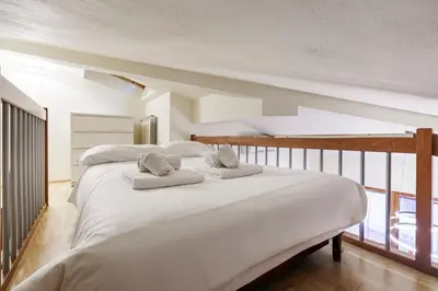 Letto o letti in una camera di Finestra sull' Arno I Netflix, wifi, AC