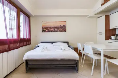 Letto o letti in una camera di Finestra sull' Arno I Netflix, wifi, AC