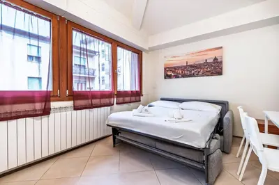 Letto o letti in una camera di Finestra sull' Arno I Netflix, wifi, AC